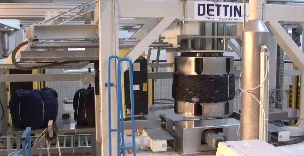 Automatiserat system för färg- och kemikaliedosering inom textilindustrin, med fokus på precision och effektivitet.